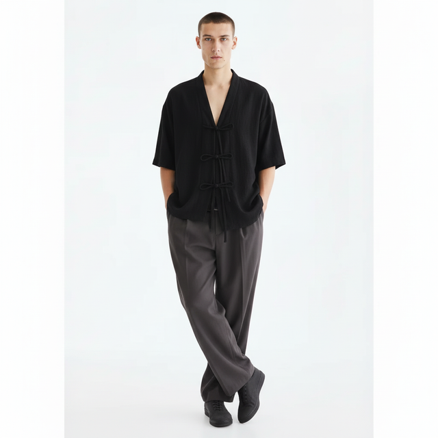 Tie-front jinbei on model in black, front view