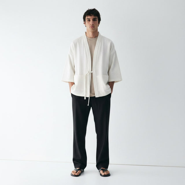 Herringbone noragi jacket in ecru, front view on model