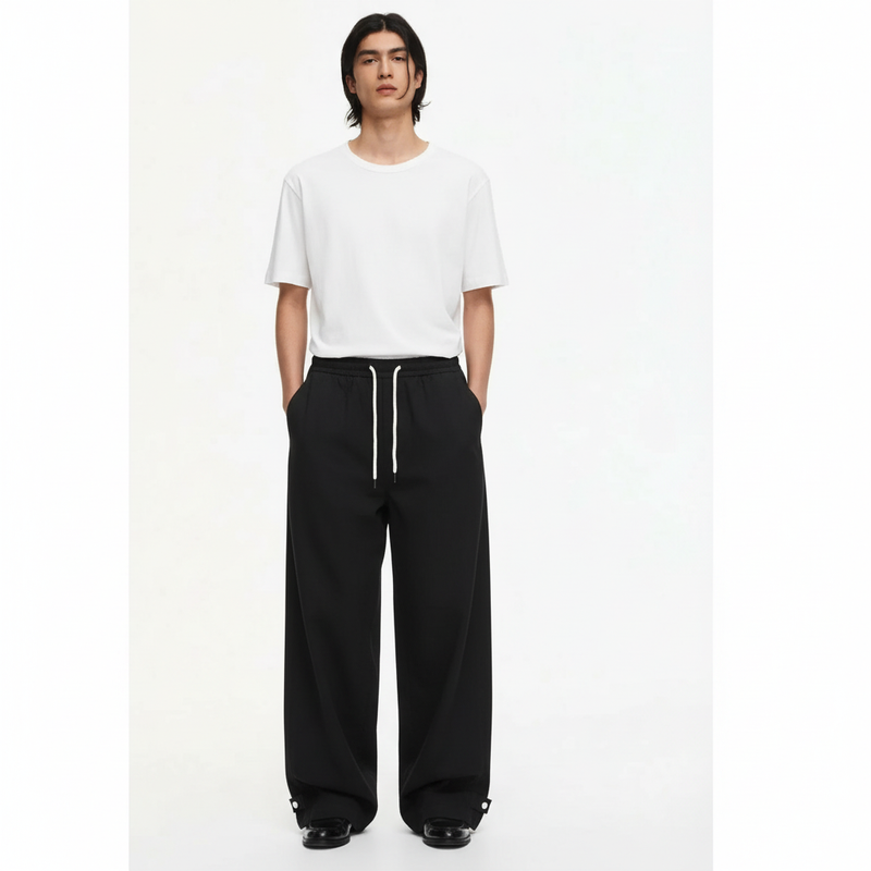 Drawstring Twill Chinos on model in black, front view