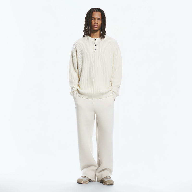 Henley Rib Sweater on model in ivory, front view