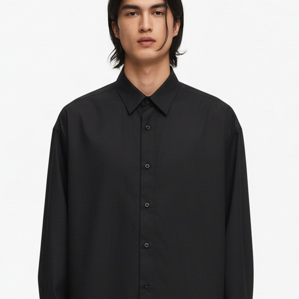 Oversized lyocell button up shirt on model, detail of the fabric and construction