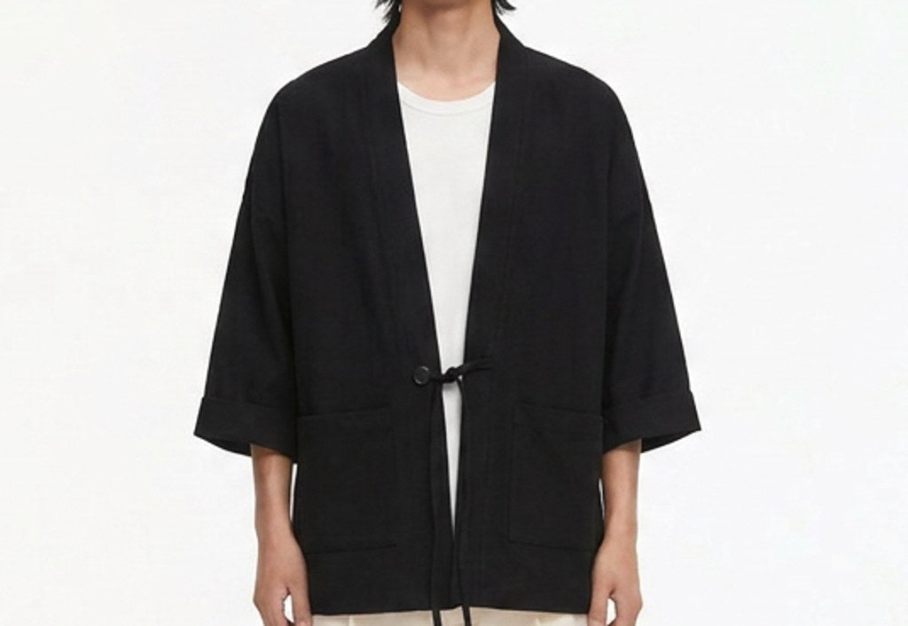 Tied noragi jacket on model, detail of the fabric and construction
