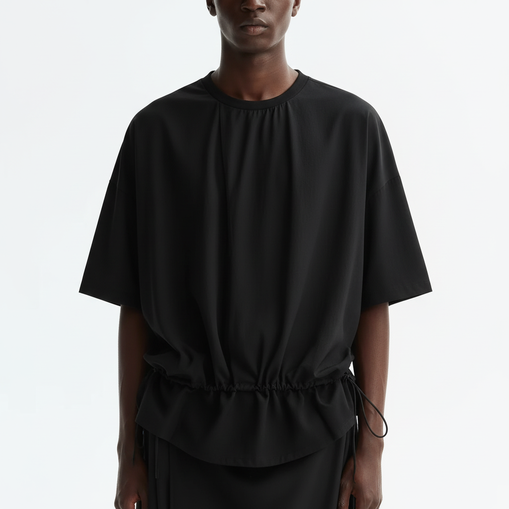 Layered drawstring t-shirt on model, close view of the fabric and construction