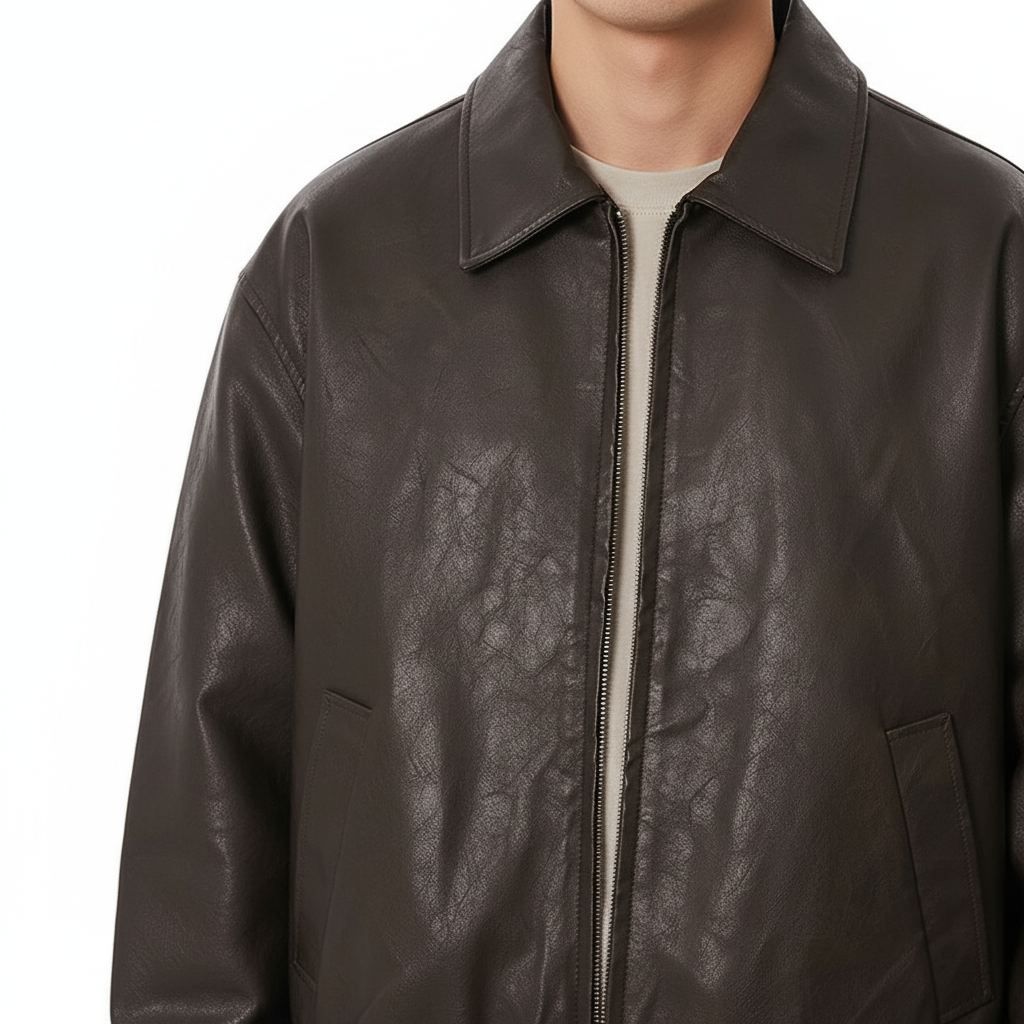 Vegan Leather Zip Jacket on model in washed brown, detail view of the collar and zip