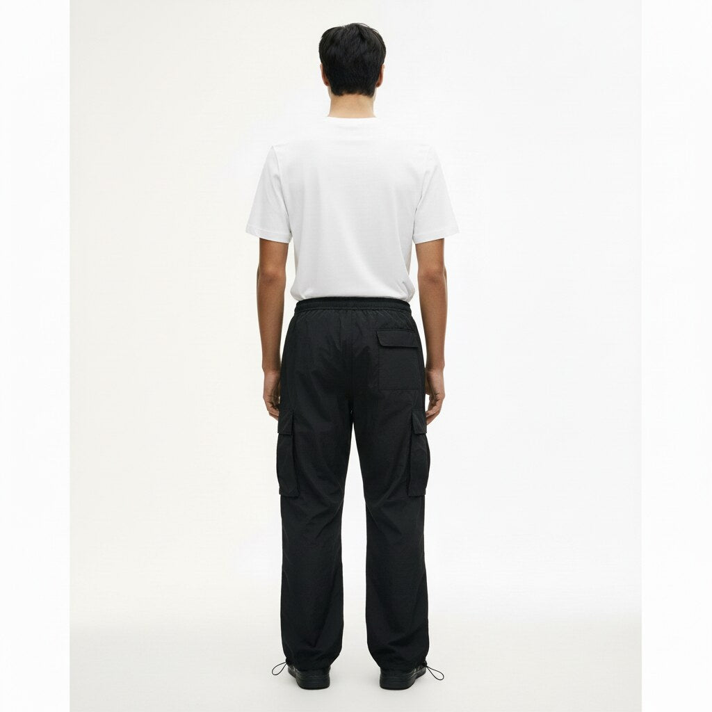 Parachute Cargo Pants on model in black, back view