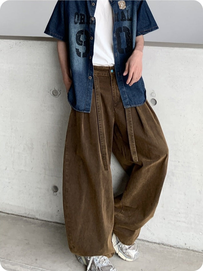 Brown balloon pants styled with a denim shirt