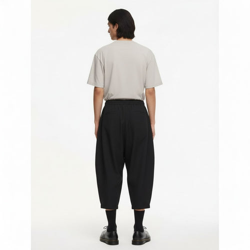 Men's Balloon Leg Tobi Trousers on model in black, back view