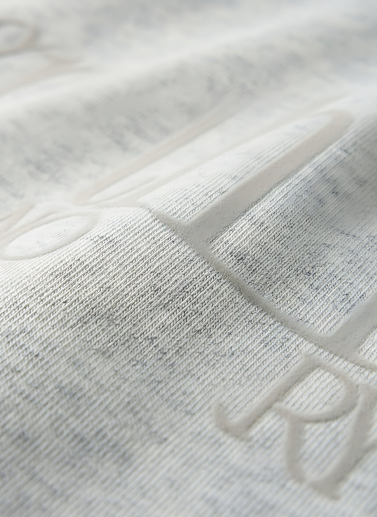 Heavyweight Rolled-Sleeve Graphic T-Shirt - Embossed lettering texture detail