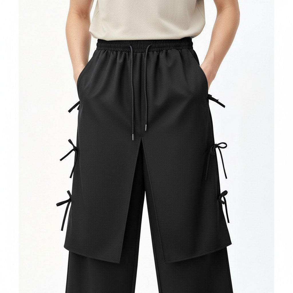 Tie-side wrap pants on model, detail view of the fabric and construction